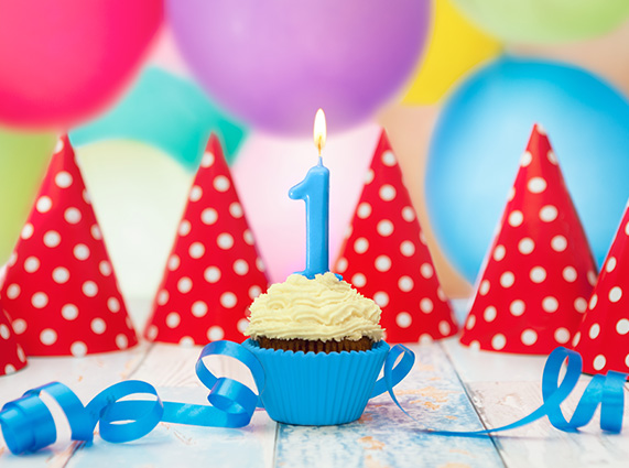 Cup cake with 1 year candle